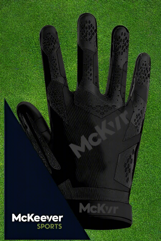 Blackout McKeever gloves on a green grass background