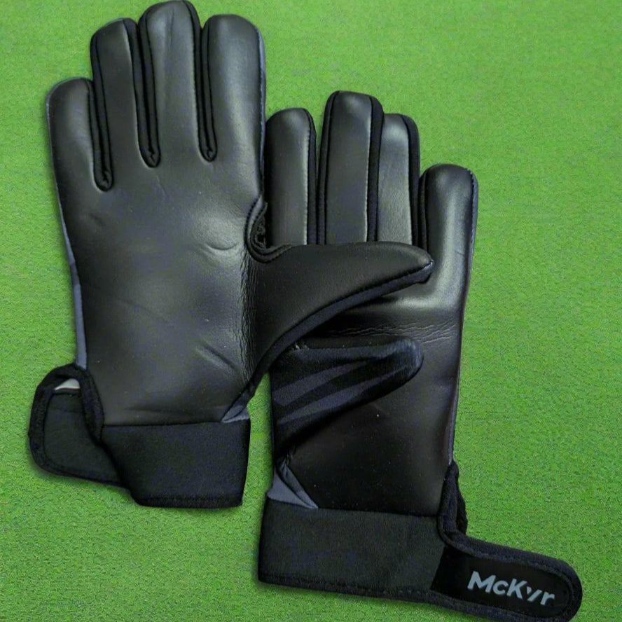Blackout McKeever gloves on a green grass background