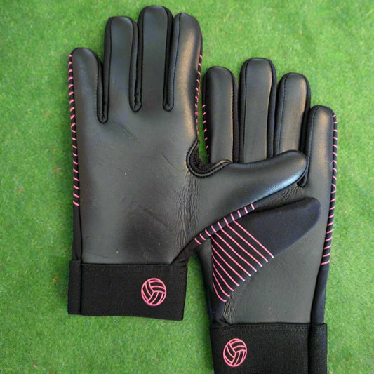Black and pink Straight edge strapless gloves on a green grass background