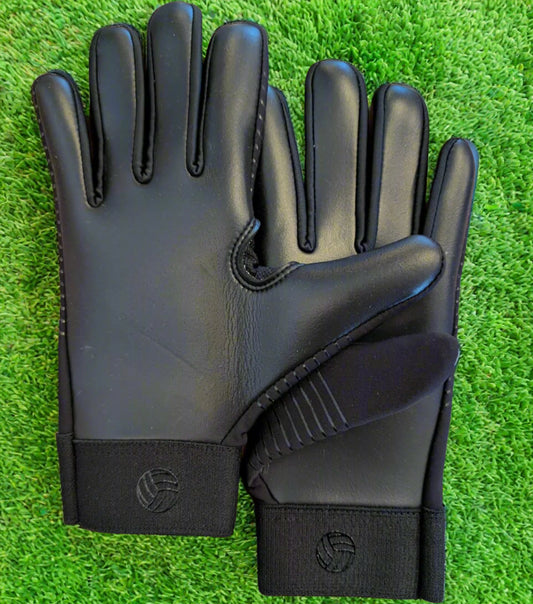 Blackout straight edge strapless gloves on a green grass background
