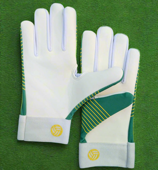 Green and yellow Straight edge strapless gloves on a green grass background
