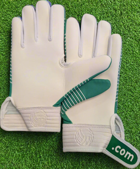 Green and white Straight edge strapped gloves on a green grass background