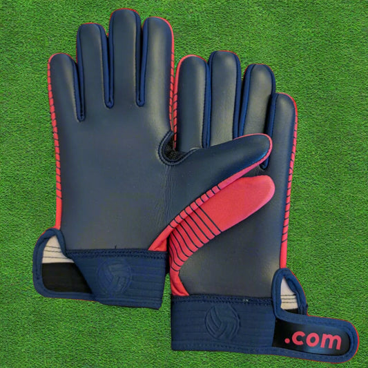 Pink and navy Straight edge strapped gloves on a green grass background